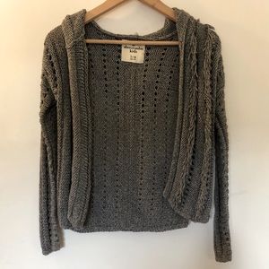 girl’s grey cardigan